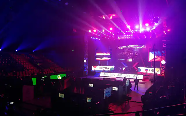 Filipino esports player concentrating during a SEA Games match