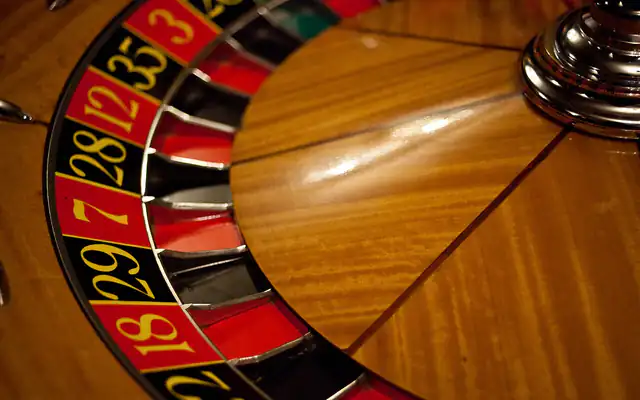 Roulette wheel spinning with the ball in motion